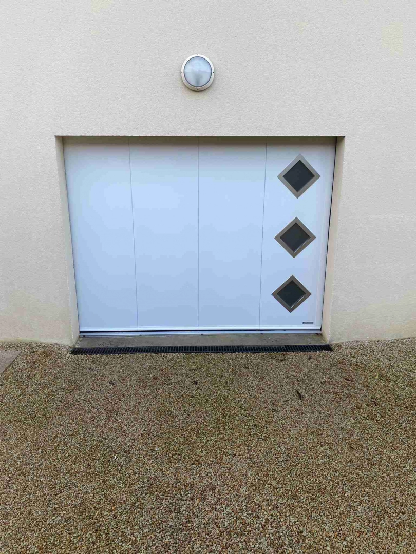 Porte de garage sectionnelle latérale - Porte de garage latérale