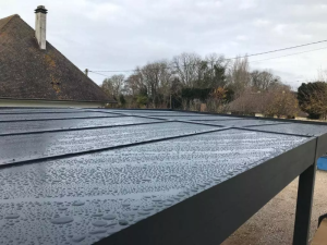 Création et installation d'un carport en aluminium à toit plat à Cabourg