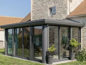 Pose d'une véranda en aluminium gris architecte à Bayeux