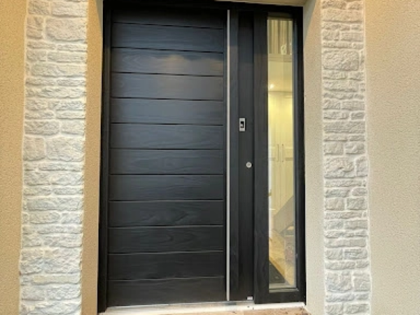 Installation d'une porte Bel’M en bois motorisée à Caen