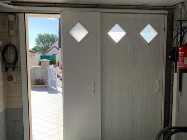 Pose d’une porte de garage sectionnelle by Fame - Caen - Calvados