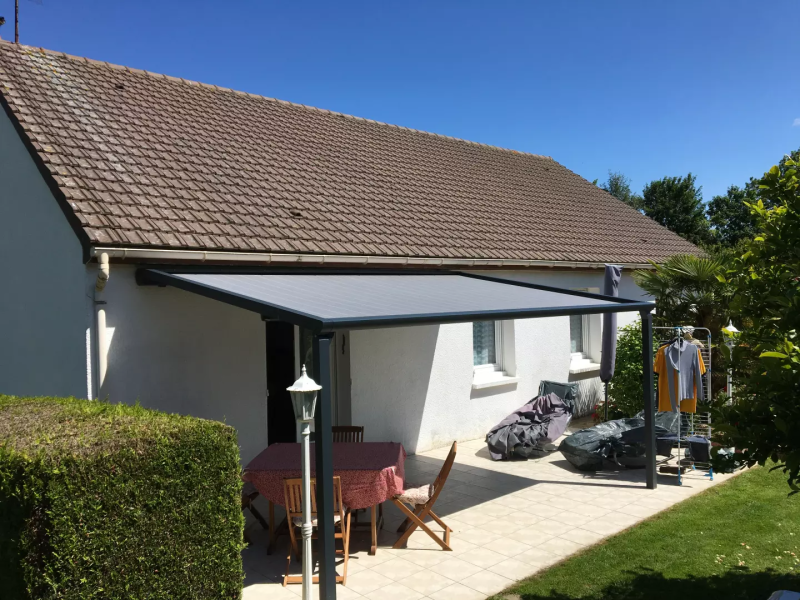 Pose d'une Storgola B128 avec toile rétractable à Caen